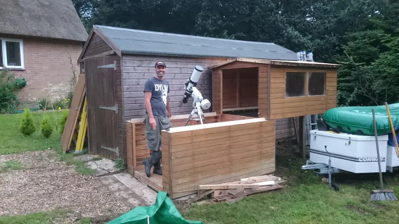 Helping a friend: shed cut in half and put on rollers